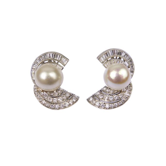 Pair of mid-20th century pearl and diamond scroll cluster earrings, each set with a domed white pearl | MasterArt